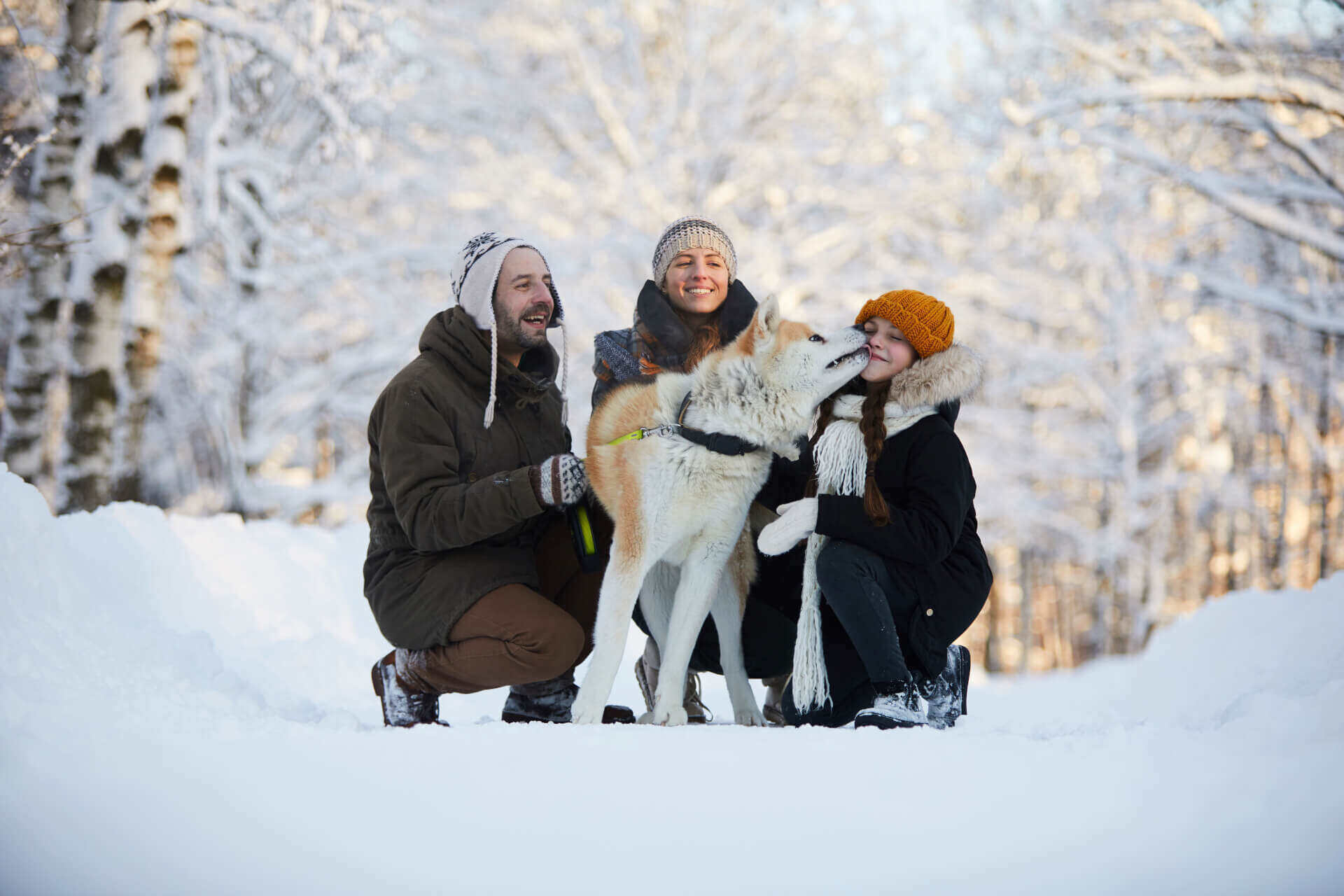 Family with their dog, on a walk
