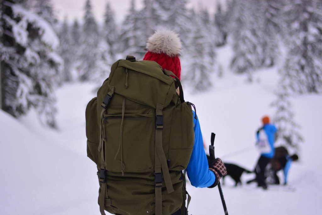 person skiing with backpack1 - Balkan Jewel Resort & Chalets